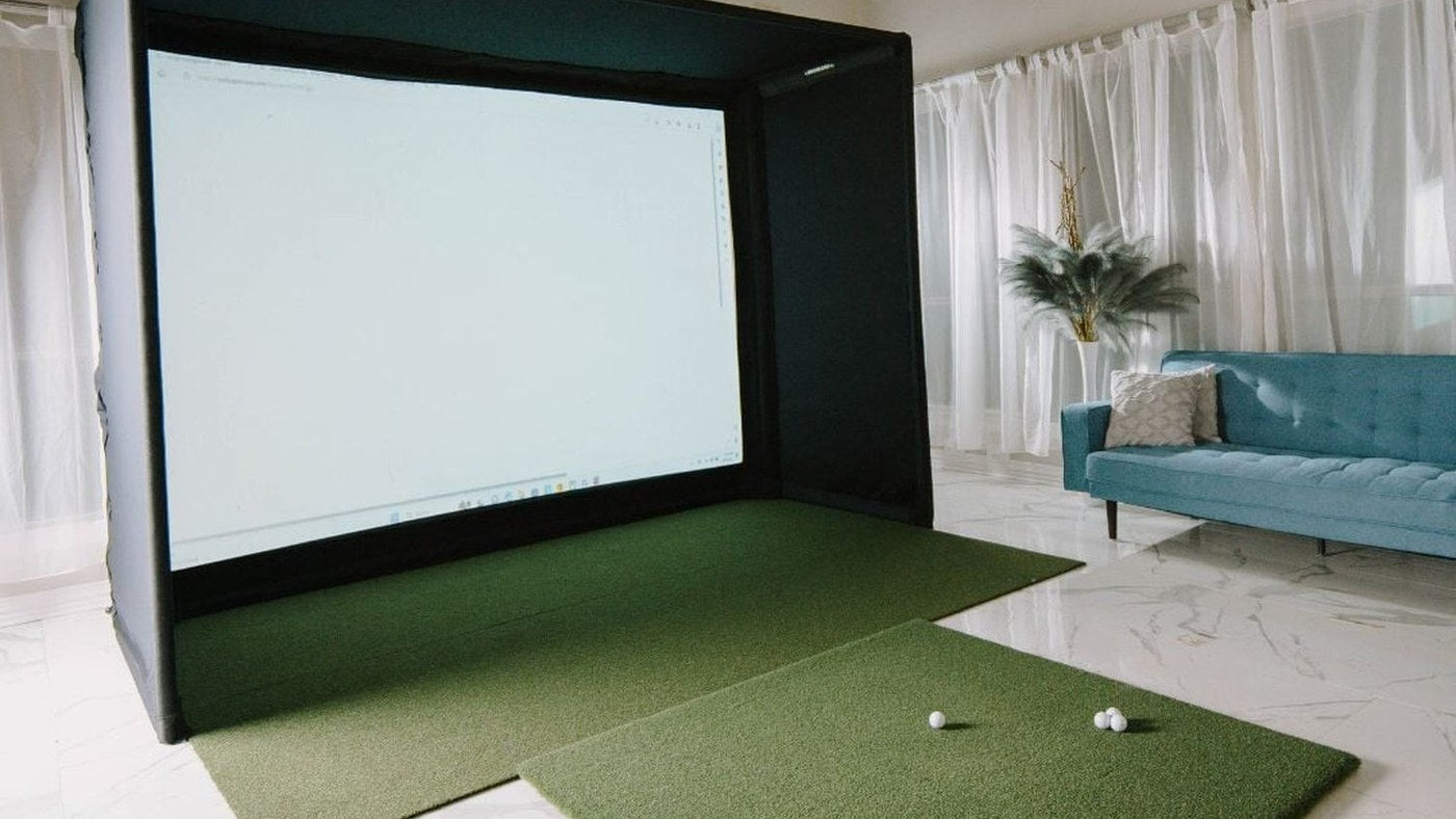 SIG10 golf enclosure installed in a home simulator room