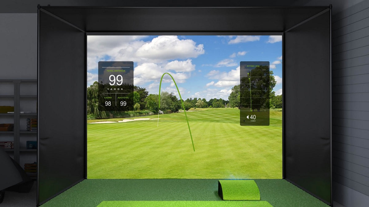 Golf simulator enclosure with a protected projector housing on the floor