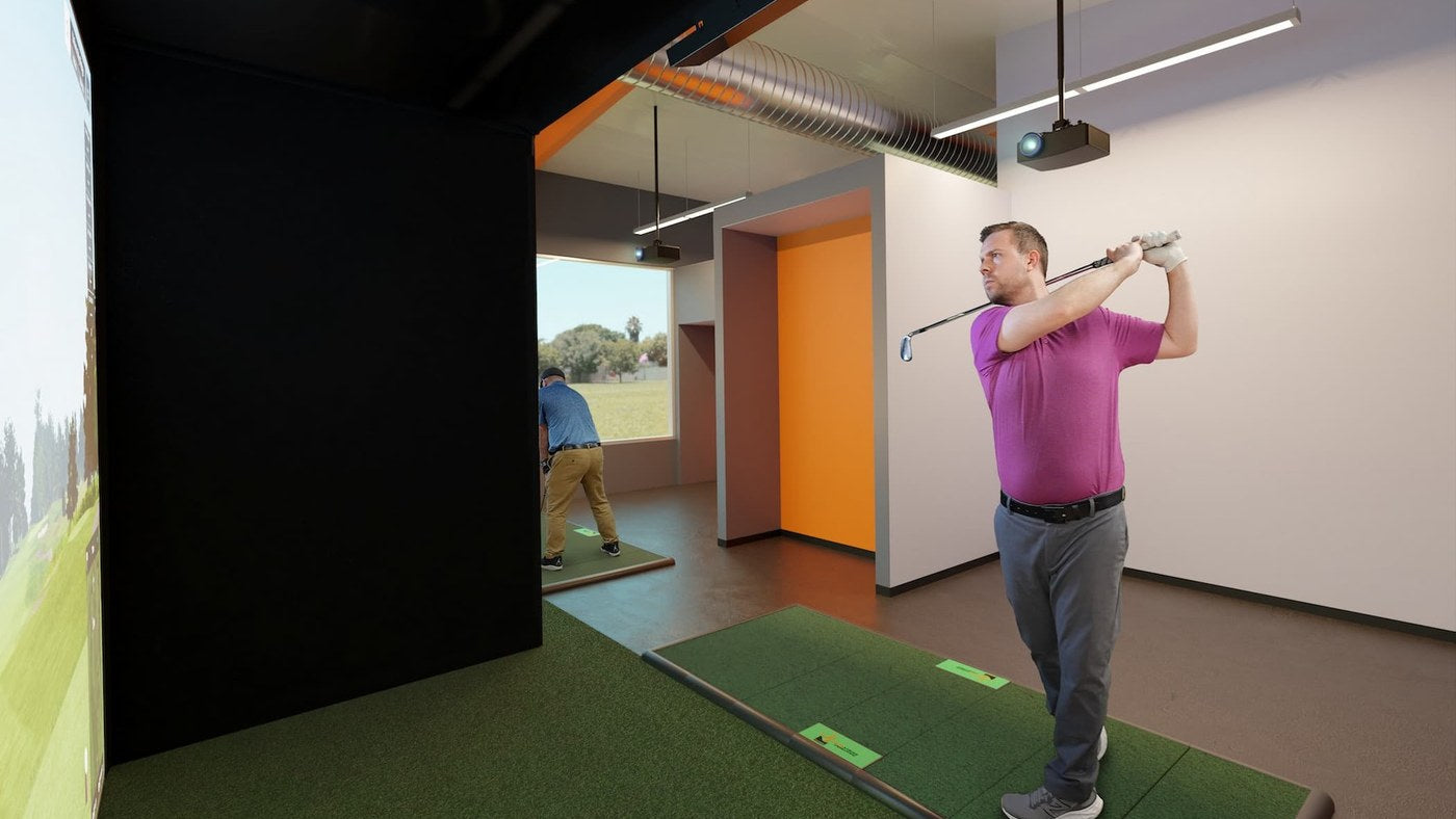 Carl's Place Pro enclosure installed in a commercial indoor golf space.
