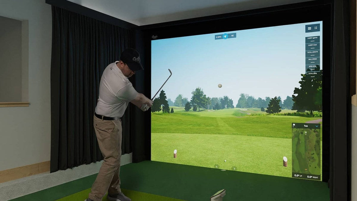 Golfer practicing inside a Carl’s Place enclosure
