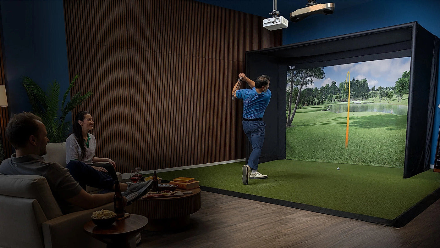 Carl's Place golf simulator enclosure in a finished indoor setup for the Carl's Place DIY versus SIG10 comparison.
