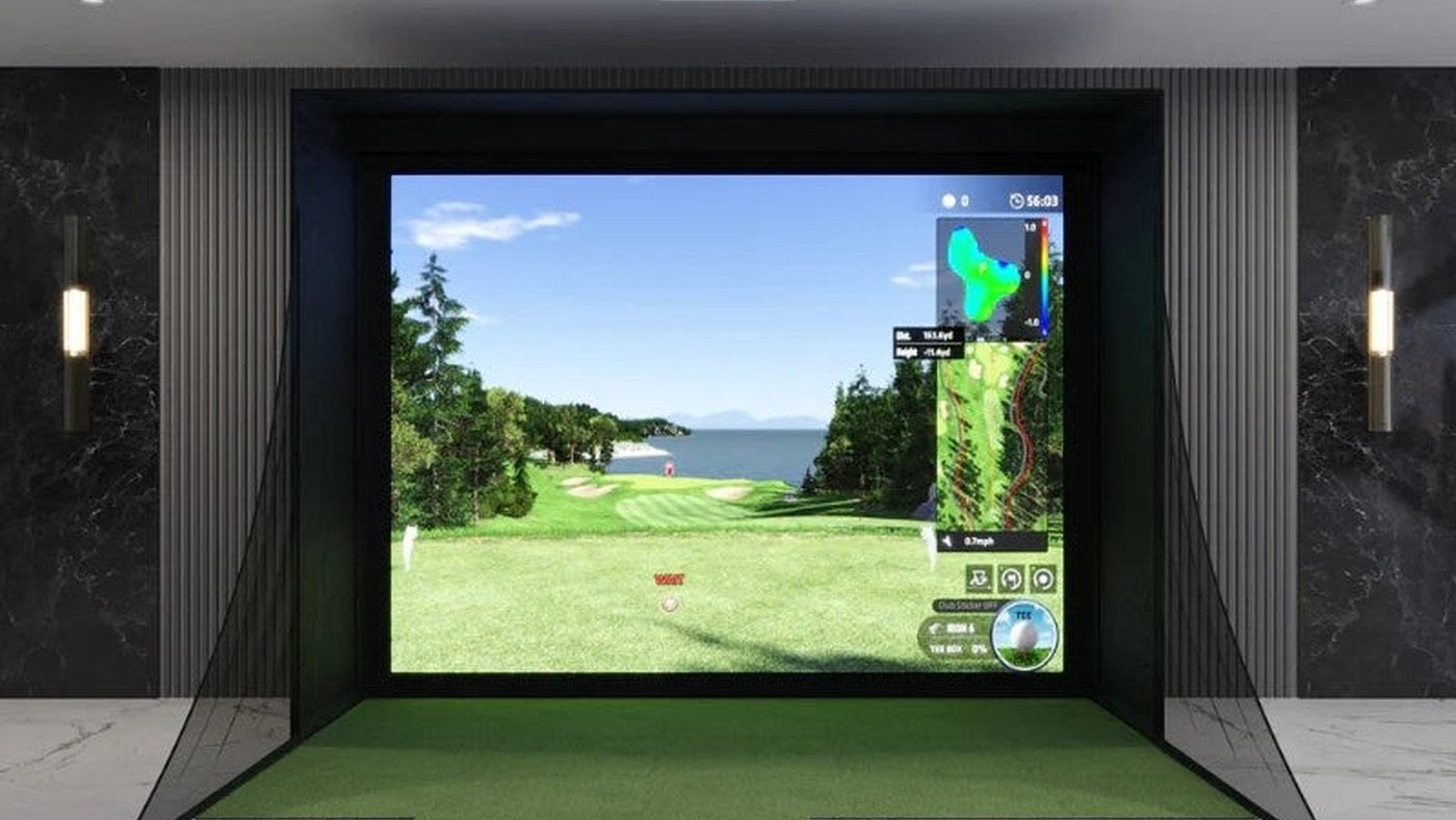 Indoor simulator bay shown with the Uneekor EYE XO2 product